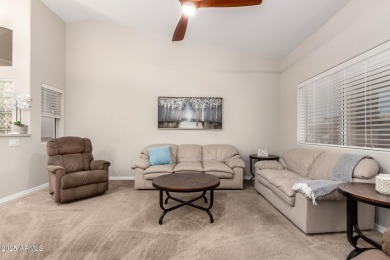 Discover the charm of this inviting 2-bedroom townhome in the on Fountain of the Sun Country Club in Arizona - for sale on GolfHomes.com, golf home, golf lot