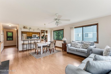 Discover the perfect blend of coastal charm and resort-style on Oak Island Golf Club in North Carolina - for sale on GolfHomes.com, golf home, golf lot