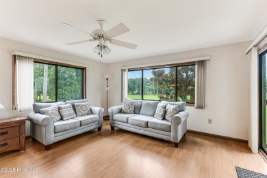 Discover the perfect blend of coastal charm and resort-style on Oak Island Golf Club in North Carolina - for sale on GolfHomes.com, golf home, golf lot