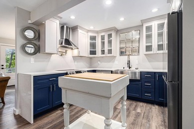 Discover the perfect blend of modern updates and mountain living on Bent Tree Golf Course in Georgia - for sale on GolfHomes.com, golf home, golf lot