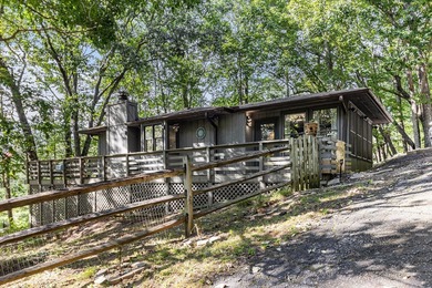 Discover the perfect blend of modern updates and mountain living on Bent Tree Golf Course in Georgia - for sale on GolfHomes.com, golf home, golf lot