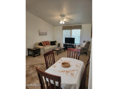 This is a lovely & quaint 2014 3 bedroom 2 bath furnished home on 3 Parks Fairways in Arizona - for sale on GolfHomes.com, golf home, golf lot