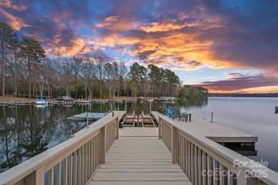 Embrace lake life at its finest in this truly exceptional on Old North State Club at Uwharrie Point Golf community in North Carolina - for sale on GolfHomes.com, golf home, golf lot