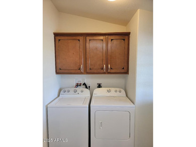 This is a lovely & quaint 2014 3 bedroom 2 bath furnished home on 3 Parks Fairways in Arizona - for sale on GolfHomes.com, golf home, golf lot