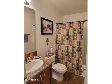 This is a lovely & quaint 2014 3 bedroom 2 bath furnished home on 3 Parks Fairways in Arizona - for sale on GolfHomes.com, golf home, golf lot