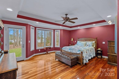 Embrace lake life at its finest in this truly exceptional on Old North State Club at Uwharrie Point Golf community in North Carolina - for sale on GolfHomes.com, golf home, golf lot