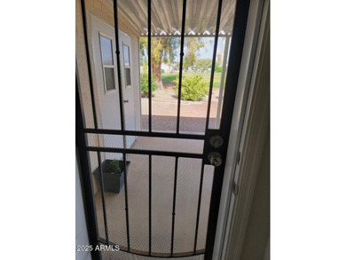 This is a lovely & quaint 2014 3 bedroom 2 bath furnished home on 3 Parks Fairways in Arizona - for sale on GolfHomes.com, golf home, golf lot