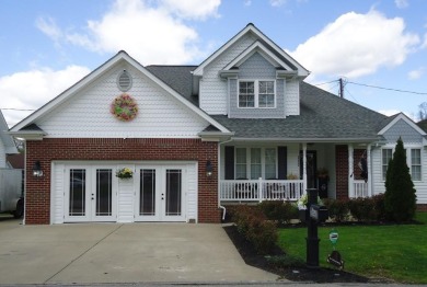 Welcome to this spacious and inviting 4-bedroom, 2.5-bath home on Paintsville Country Club in Kentucky - for sale on GolfHomes.com, golf home, golf lot