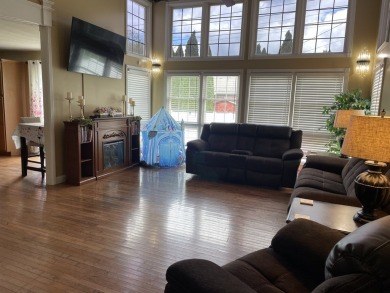 Welcome to this spacious and inviting 4-bedroom, 2.5-bath home on Paintsville Country Club in Kentucky - for sale on GolfHomes.com, golf home, golf lot