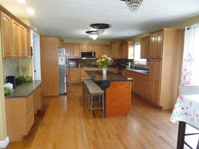 Welcome to this spacious and inviting 4-bedroom, 2.5-bath home on Paintsville Country Club in Kentucky - for sale on GolfHomes.com, golf home, golf lot