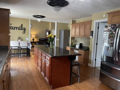 Welcome to this spacious and inviting 4-bedroom, 2.5-bath home on Paintsville Country Club in Kentucky - for sale on GolfHomes.com, golf home, golf lot