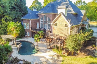 SUPERB TRIPLE-LEVEL ALL BRICK, boasting a fresh new ENTIRE HOME on TPC At Sugarloaf Golf Club in Georgia - for sale on GolfHomes.com, golf home, golf lot