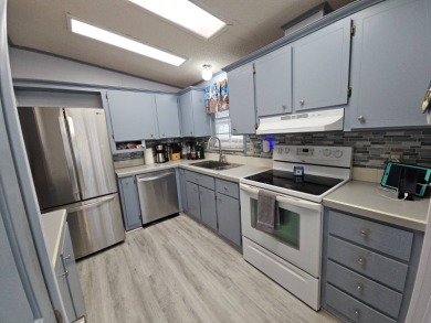 Discover Florida Living in this 1989, 2-bed/2-bath home located on The Club At Pointe West in Florida - for sale on GolfHomes.com, golf home, golf lot