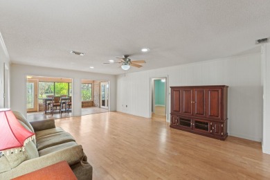 This beautiful 4/2 is situated in the charming Lake Lorraine on Shalimar Pointe Golf and Country Club in Florida - for sale on GolfHomes.com, golf home, golf lot
