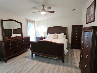 Discover Florida Living in this 1989, 2-bed/2-bath home located on The Club At Pointe West in Florida - for sale on GolfHomes.com, golf home, golf lot