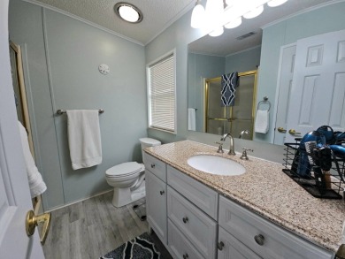 Discover Florida Living in this 1989, 2-bed/2-bath home located on The Club At Pointe West in Florida - for sale on GolfHomes.com, golf home, golf lot