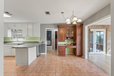 This beautiful 4/2 is situated in the charming Lake Lorraine on Shalimar Pointe Golf and Country Club in Florida - for sale on GolfHomes.com, golf home, golf lot
