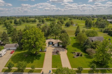 This stunning home boasts 5 bedrooms, 3.5 baths situated on .83 on Pheasant Ridge Municipal Golf Course in Iowa - for sale on GolfHomes.com, golf home, golf lot