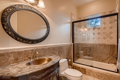 Experience the pinnacle of luxury living in this 8,447 SF on Red Rock Country Club in Nevada - for sale on GolfHomes.com, golf home, golf lot