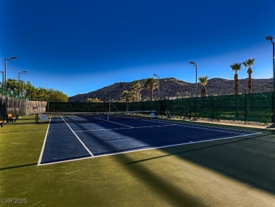 Experience the pinnacle of luxury living in this 8,447 SF on Red Rock Country Club in Nevada - for sale on GolfHomes.com, golf home, golf lot