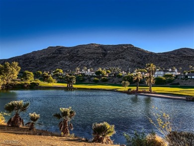 Experience the pinnacle of luxury living in this 8,447 SF on Red Rock Country Club in Nevada - for sale on GolfHomes.com, golf home, golf lot