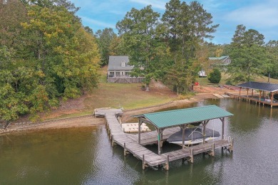 Live The Lake Life! This inviting home has traditional styling for sale on GolfHomes.com