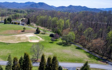 This golf course lot is exactly what you have been looking for on Mountain Harbour Golf Club in North Carolina - for sale on GolfHomes.com, golf home, golf lot