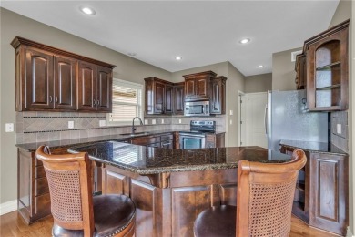 This gorgeous home is located on the 9th fairway of the golf on Golf Club of Creekmoor in Missouri - for sale on GolfHomes.com, golf home, golf lot