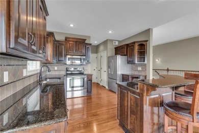 This gorgeous home is located on the 9th fairway of the golf on Golf Club of Creekmoor in Missouri - for sale on GolfHomes.com, golf home, golf lot