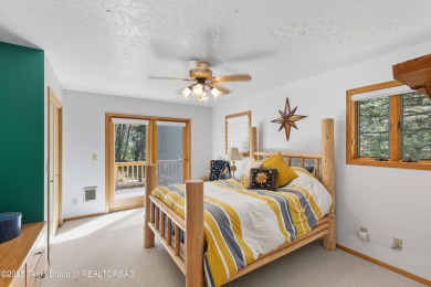 Surrounded by towering evergreens and endless mountain views on Star Valley RV Golf Course in Wyoming - for sale on GolfHomes.com, golf home, golf lot