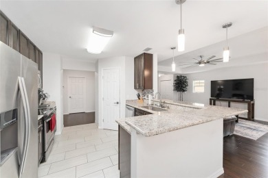 Discover modern comfort and convenience in this beautifully on Ironwood Golf and Country Club in Florida - for sale on GolfHomes.com, golf home, golf lot