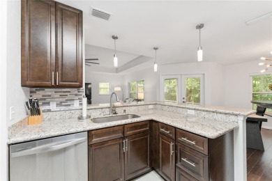 Discover modern comfort and convenience in this beautifully on Ironwood Golf and Country Club in Florida - for sale on GolfHomes.com, golf home, golf lot