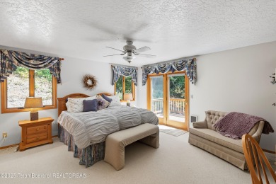 Surrounded by towering evergreens and endless mountain views on Star Valley RV Golf Course in Wyoming - for sale on GolfHomes.com, golf home, golf lot