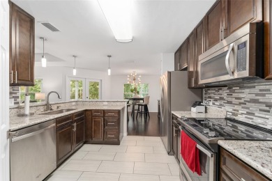 Discover modern comfort and convenience in this beautifully on Ironwood Golf and Country Club in Florida - for sale on GolfHomes.com, golf home, golf lot