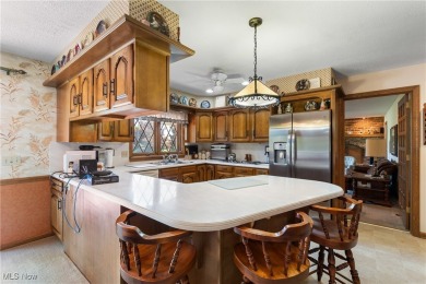 Discover timeless charm in this meticulously maintained custom on Ohio Prestwick Country Club in Ohio - for sale on GolfHomes.com, golf home, golf lot