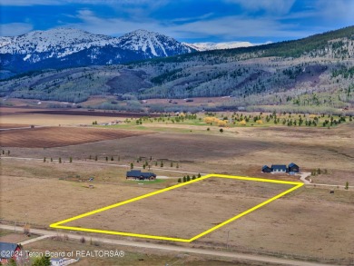 Take in breathtaking sunsets over the Bighole Mountains from on Targhee Village Golf Course in Wyoming - for sale on GolfHomes.com, golf home, golf lot