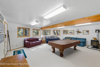 Surrounded by towering evergreens and endless mountain views on Star Valley RV Golf Course in Wyoming - for sale on GolfHomes.com, golf home, golf lot