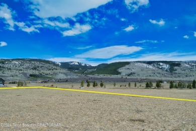 Take in breathtaking sunsets over the Bighole Mountains from on Targhee Village Golf Course in Wyoming - for sale on GolfHomes.com, golf home, golf lot