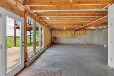 This gorgeous home is located on the 9th fairway of the golf on Golf Club of Creekmoor in Missouri - for sale on GolfHomes.com, golf home, golf lot