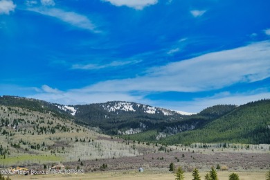 Take in breathtaking sunsets over the Bighole Mountains from on Targhee Village Golf Course in Wyoming - for sale on GolfHomes.com, golf home, golf lot