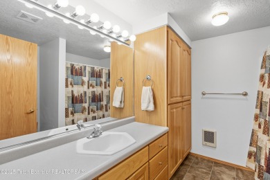Surrounded by towering evergreens and endless mountain views on Star Valley RV Golf Course in Wyoming - for sale on GolfHomes.com, golf home, golf lot