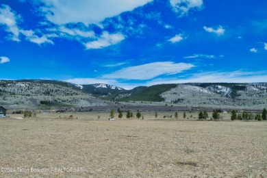 Take in breathtaking sunsets over the Bighole Mountains from on Targhee Village Golf Course in Wyoming - for sale on GolfHomes.com, golf home, golf lot