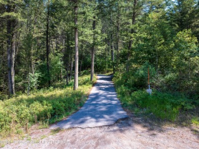 Surrounded by towering evergreens and endless mountain views on Star Valley RV Golf Course in Wyoming - for sale on GolfHomes.com, golf home, golf lot