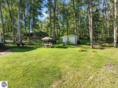 Tucked away on a quiet cul-de-sac just behind the Bay View Golf on Petoskey-Bay View Country Club in Michigan - for sale on GolfHomes.com, golf home, golf lot
