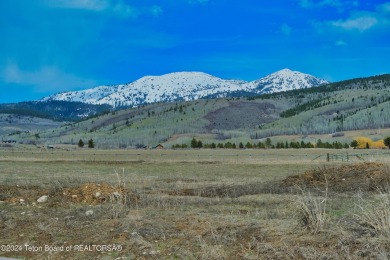 Take in breathtaking sunsets over the Bighole Mountains from on Targhee Village Golf Course in Wyoming - for sale on GolfHomes.com, golf home, golf lot