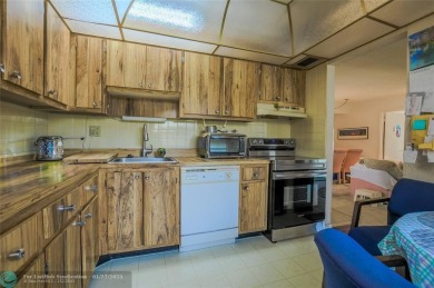 Welcome home to Isle of Capri- a 1-bed,1.5-bath condo located in on Kings Point Golf -Flanders Way in Florida - for sale on GolfHomes.com, golf home, golf lot