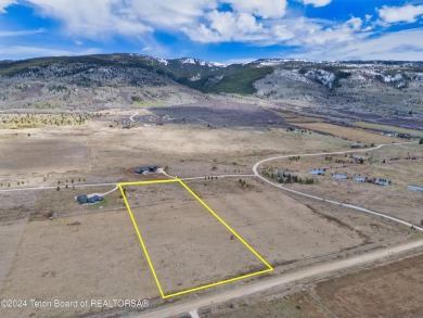 Take in breathtaking sunsets over the Bighole Mountains from on Targhee Village Golf Course in Wyoming - for sale on GolfHomes.com, golf home, golf lot