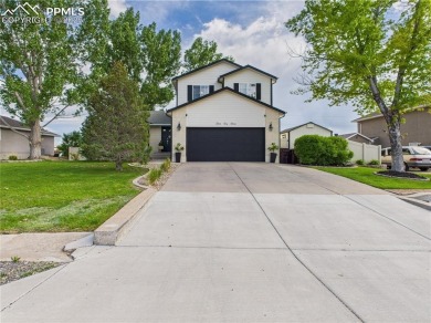 Experience luxury and comfort in this beautiful 2-story home on Desert Hawk At Pueblo West in Colorado - for sale on GolfHomes.com, golf home, golf lot