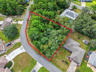 BUILD YOUR DREAM HOME on this spacious 0.40-acre CORNER lot on Oak Hills Country Club in Florida - for sale on GolfHomes.com, golf home, golf lot