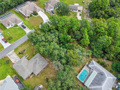 BUILD YOUR DREAM HOME on this spacious 0.40-acre CORNER lot on Oak Hills Country Club in Florida - for sale on GolfHomes.com, golf home, golf lot